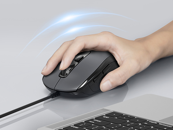 a hand holding a mouse on a mouse pad