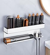 Wall-mounted silver metal rack holding multiple black hair styling tools and accessories with organized storage compartments.