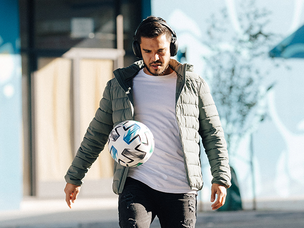 Soccer player with Jlab Headphones