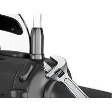 Remove the stock mirror screws with a wrench.