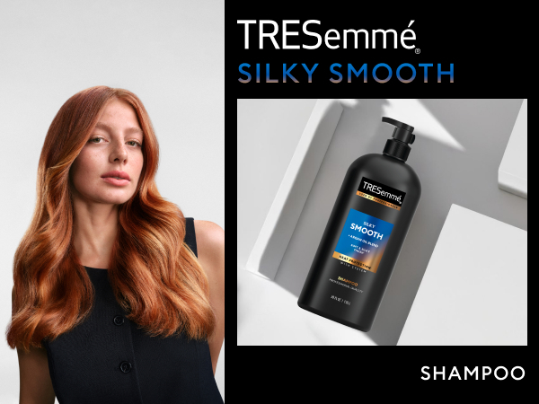 Red-haired model with soft waves beside a TRESemmé shampoo bottle on a modern white backdrop.