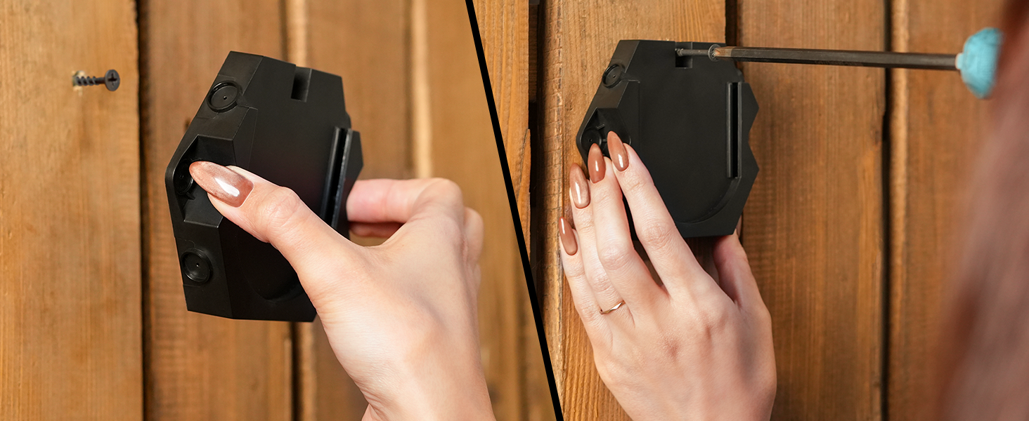Mounting Zanis Laser Level base on wooden wall using screws for firm attachment.