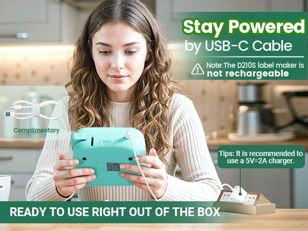 labelmaker machine with tape and USB-C cable to stay powered