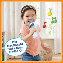 Child with microphone and lyrics to Old MacDonald