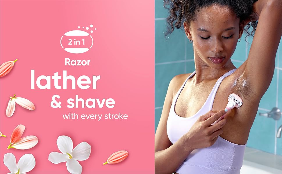 Woman shaving underarms with Venus ComfortGlide with White Tea scented 2-in1 lubrication