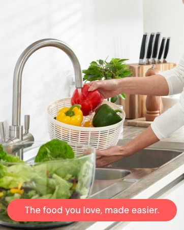 Lifestyle image of woman in the kitchen featuring Fullstar productss