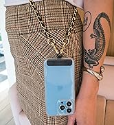 Case Clinger attachment for your phone so you can go hands free with a lanrd or even a wristlet