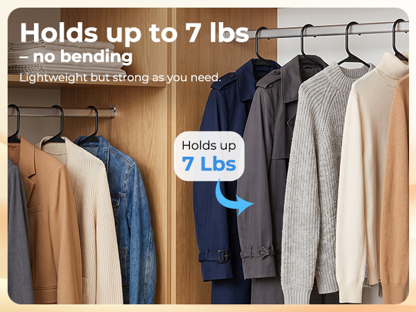 Heavy-Duty Black plastic hanger holding heavy winter coat. Holds 7 lbs without bending or warping
