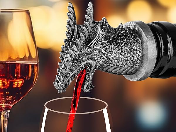 Decorative dragon-shaped wine pourer attached to bottle neck, pouring red wine into glass with warm ambient lighting.