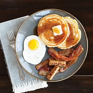 breakfast plate;eggs;bacon;sausage;sunny side up