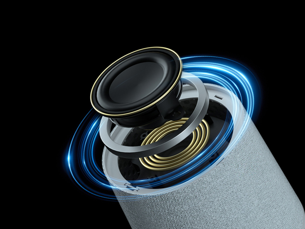 Cross-section diagram of a cylindrical device, showing layers of black, white, and gold components with blue glowing rings.