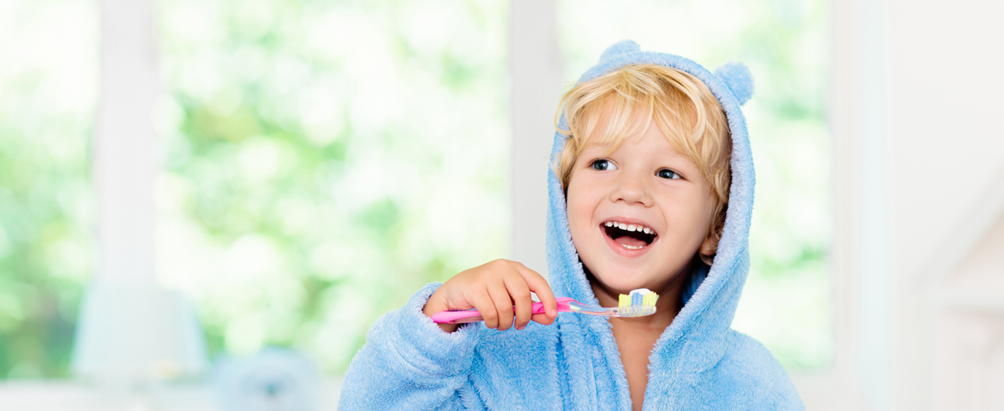 little boy brushing