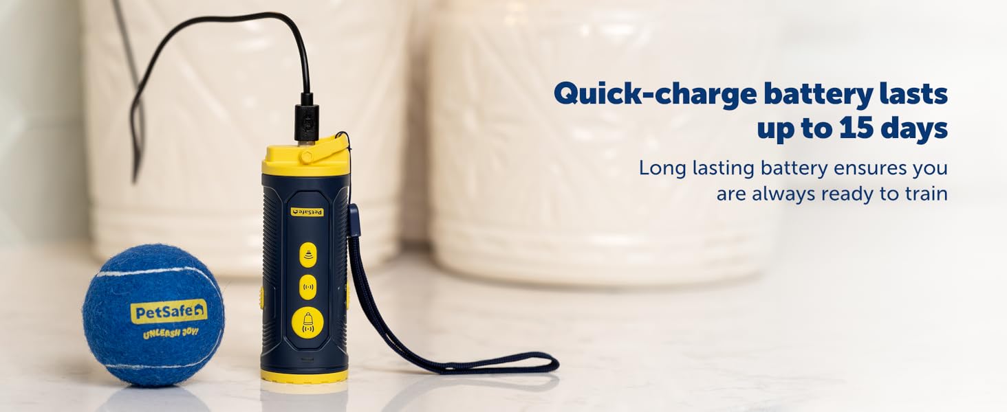 PetSafe Collarless Trainer charges upright beside a toy; battery lasts up to 15 days.