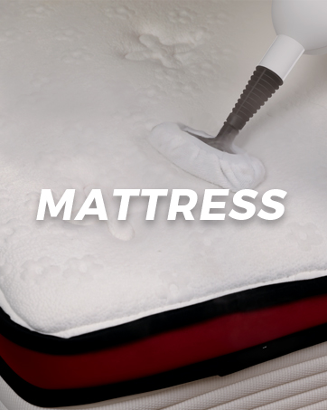 Steam mop cleaning mattress in bedroom