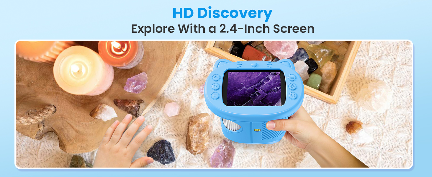 Text reads 'HD Discovery Explore With a 2.4-Inch Screen'. Shows a blue handheld device with screen display against wooden surface with scattered rocks/minerals.