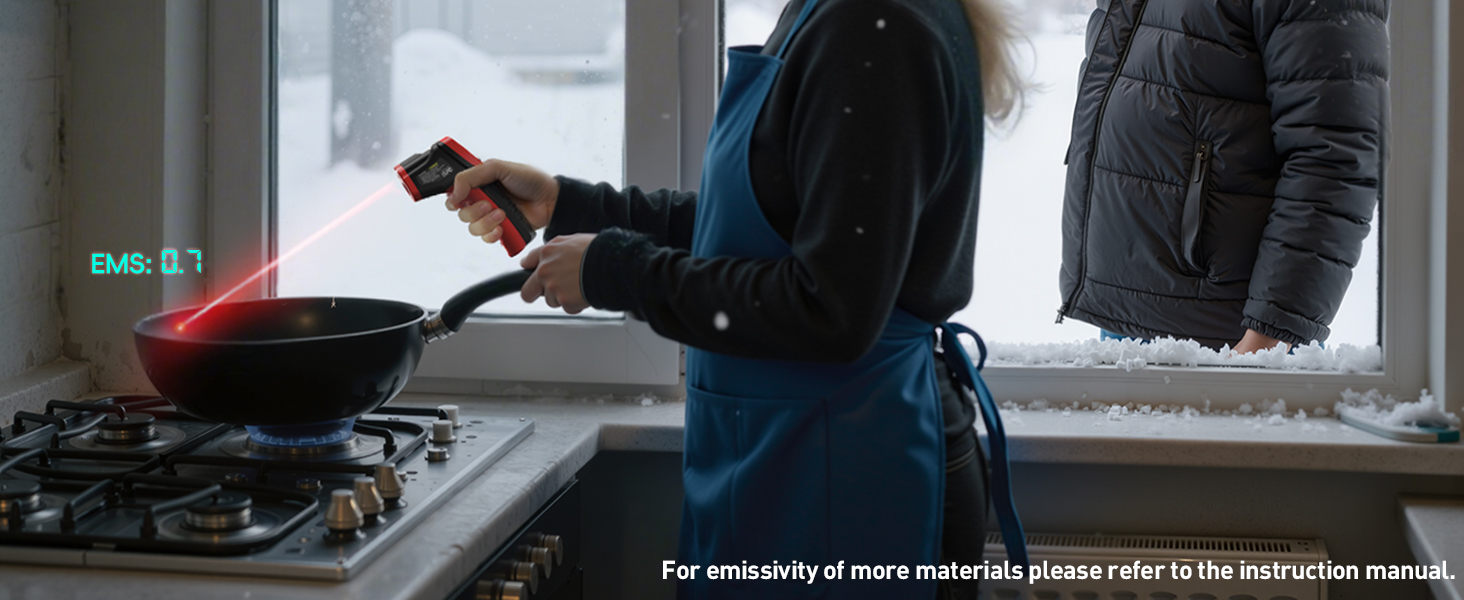 Close-up of cooking pan on gas stove with person preparing food in dark interior kitchen setting.