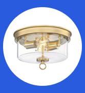 The Lebanon is a champagne brass finish, two-light flush mount ceiling fixture with clear glass.
