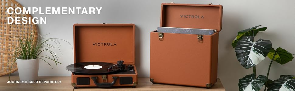 Brown vinyl record storage case beside matching suitcase turntable