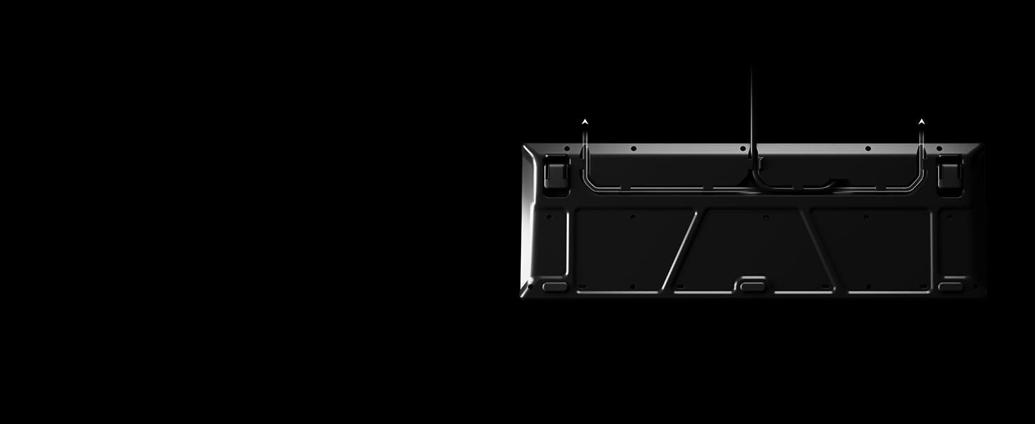 - Apex 3 underside displaying three channel options for the cable to exit the keyboard