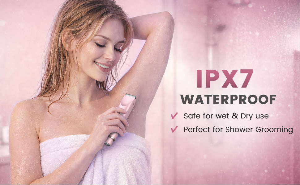 Woman using a waterproof bikini trimmer for underarm grooming in the shower.