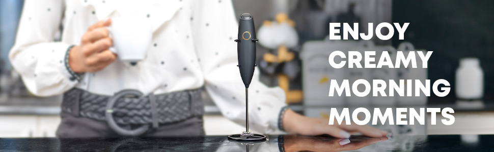 Milk frother with stand for making creamy morning drinks