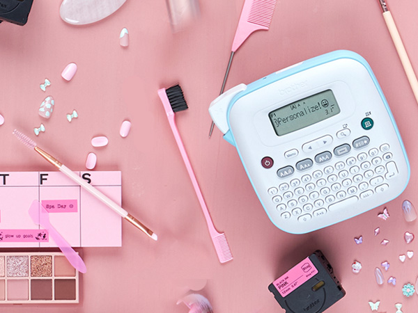 P-touch PTN20 labeler, pink labels with black text: calendar with routine, makeup with color names