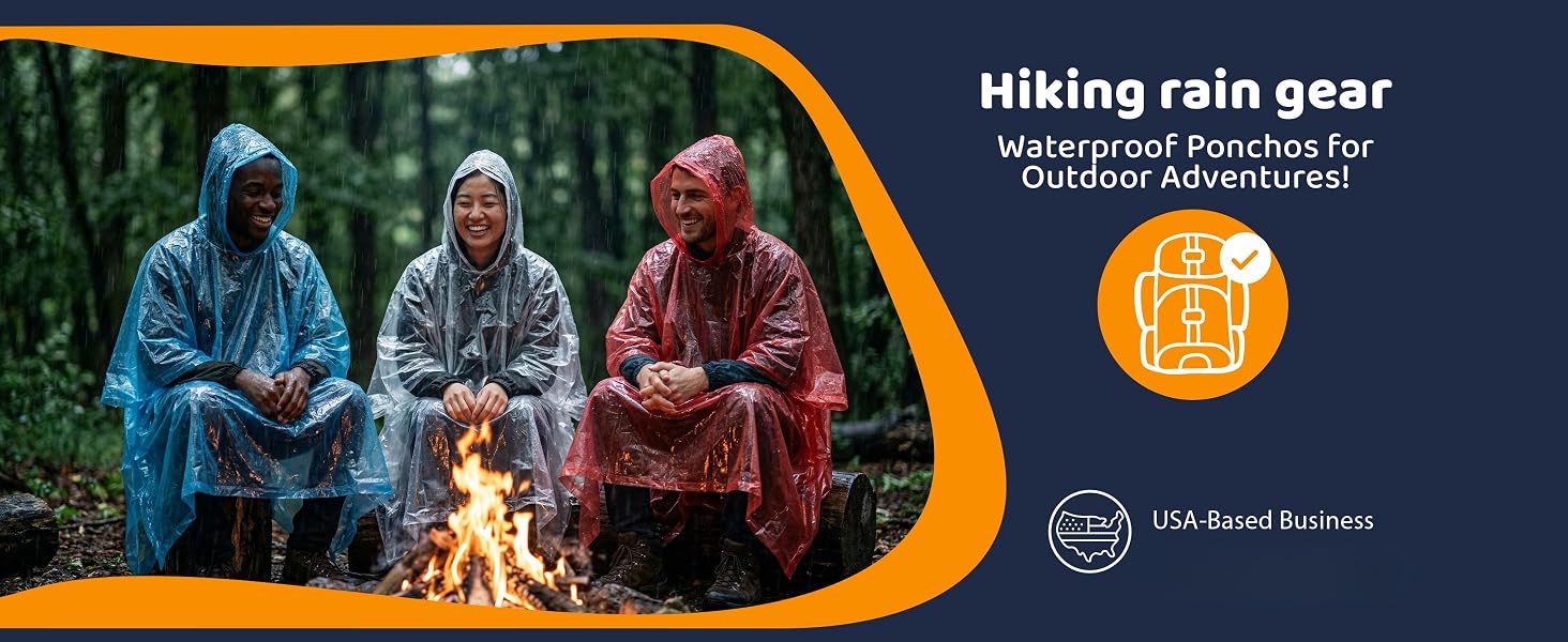 Friends wearing rain ponchos camping