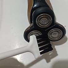 Electric shaver cleaning brush