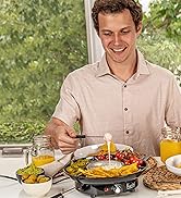 man enjoying melted cheese with the fondue maker