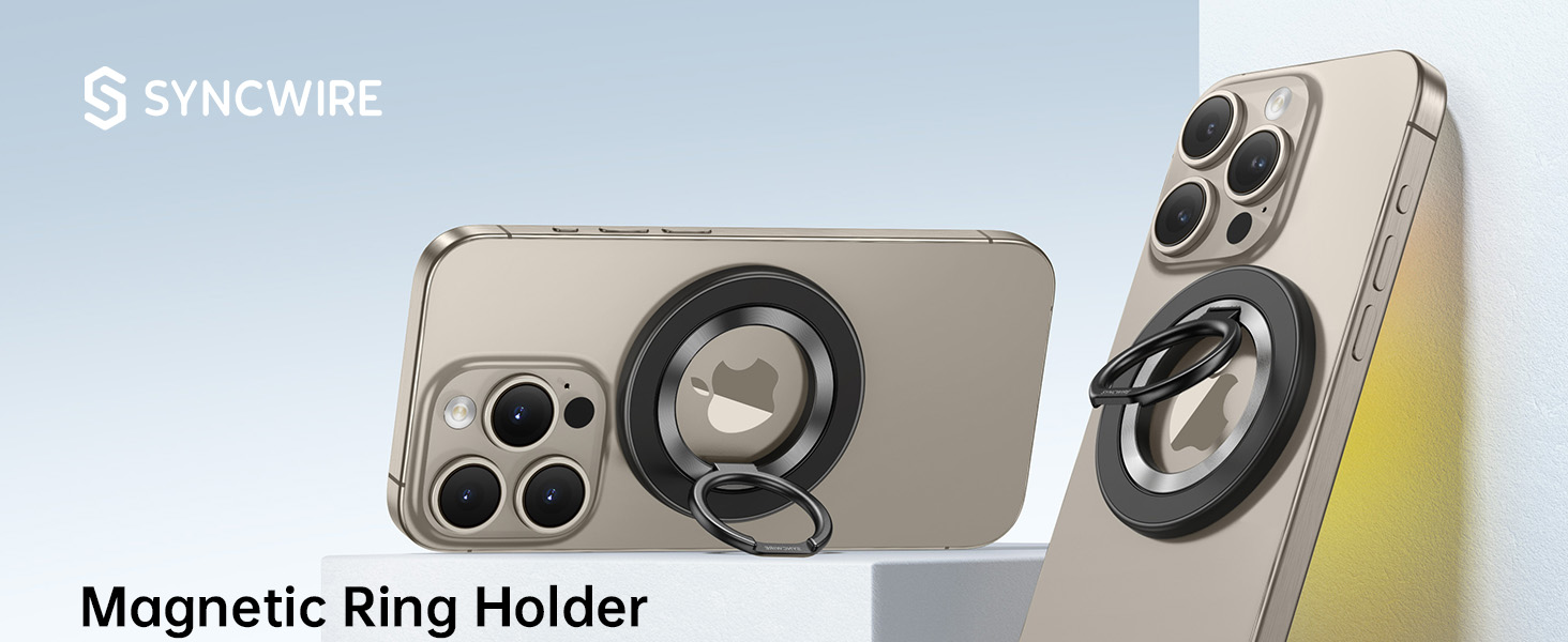 Magnetic ring holder accessory for smartphones. Silver-colored with circular design, shown attached to phone case with triple camera setup.