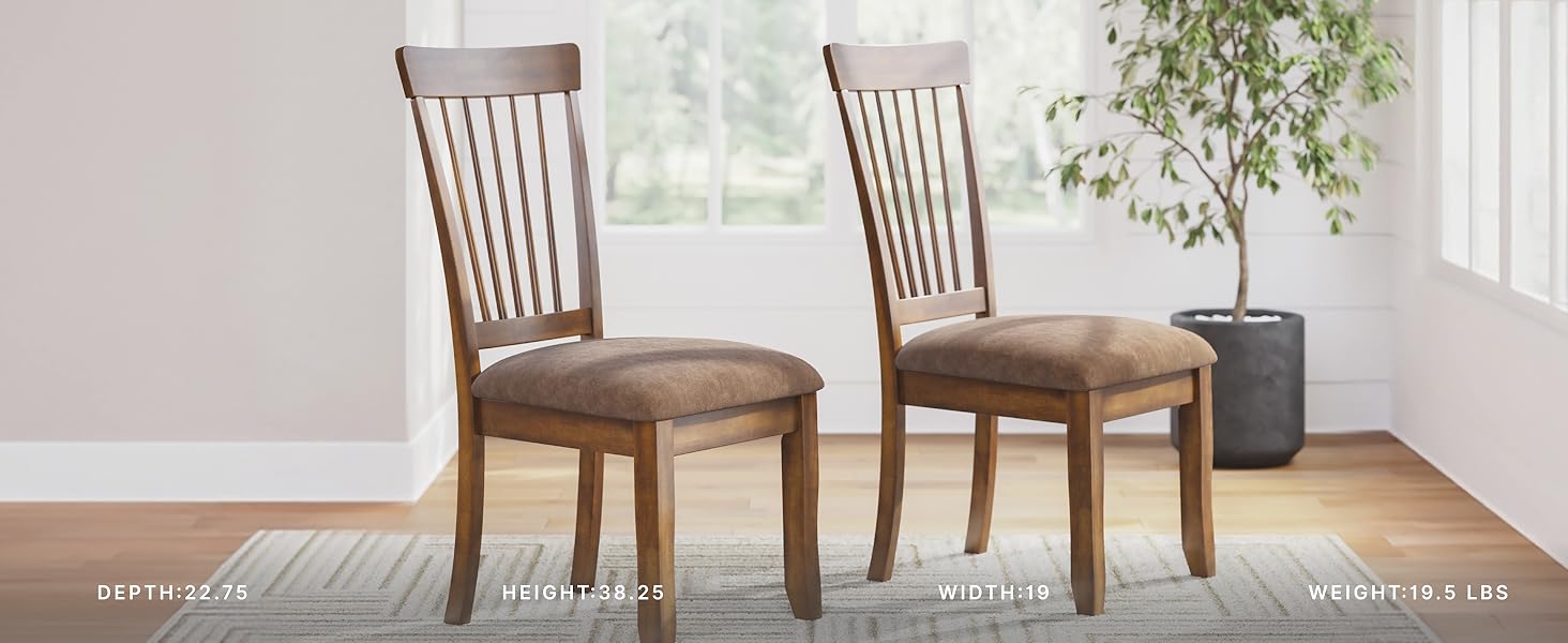 Lifestyle scene upholstered dining chairs arranged around a kitchen table