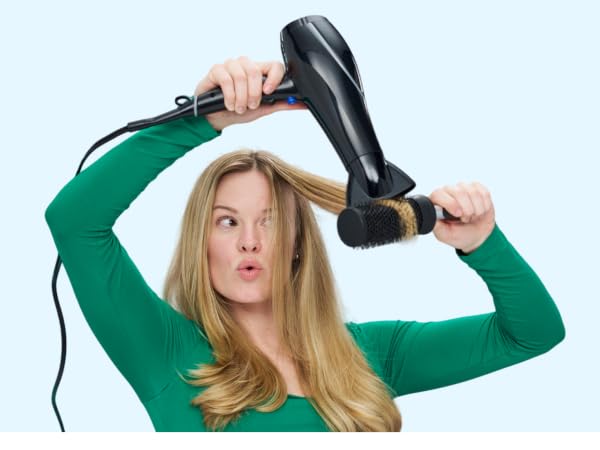 Woman drying hair