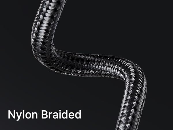 Close-up of a black nylon braided cord or cable against a dark background, showcasing its woven texture and flexibility.