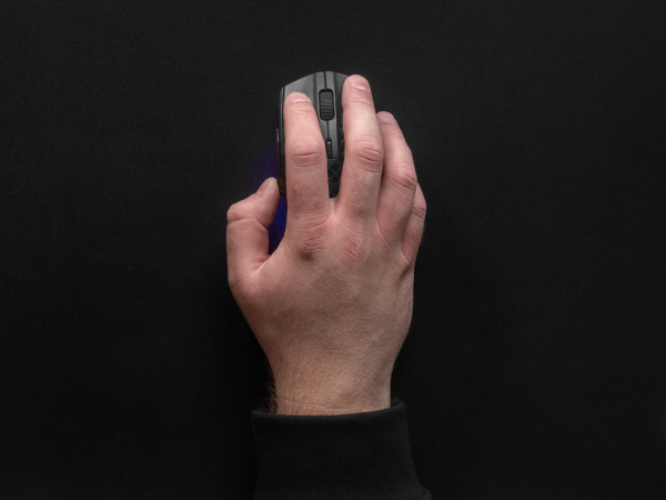 Hand on mouse demonstrating wrist support