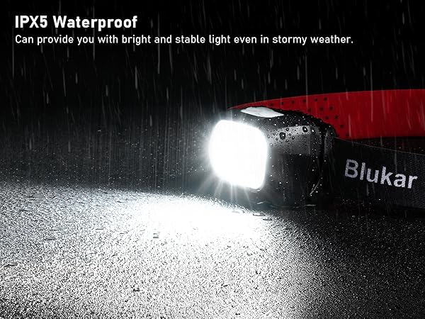Waterproof light illuminating rainy scene. Bright beam shines on wet ground. Text indicates IPX5 waterproof rating for stable light in stormy weather.